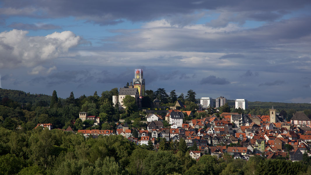 Maggi Kronberg Cityscape of Kronberg im Taunus with castle tower disguised as Maggi bottle